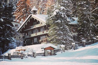 Chalet in a snowy forest