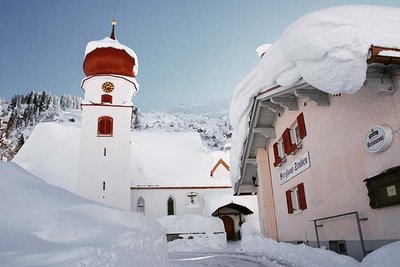 Snow covered building in the resort centre